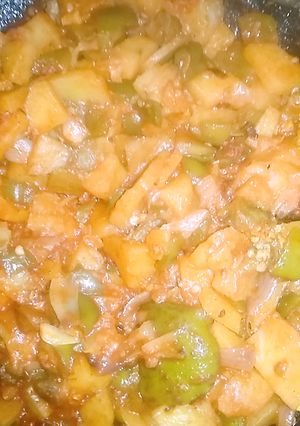 A picture of Aloo Shimla mirch (potato,capsicum).
