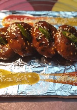 A picture of Veggy Suji Potato Snacks(With Hot and Sweet Garlic sauce).