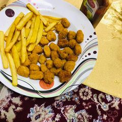 French fries & chicken popcorns#Ramzsn special A picture of French fries & chicken popcorns#Ramzsn special.