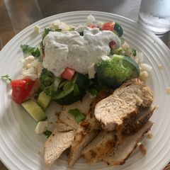 A picture of Greek chicken and couscous.