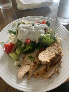 A picture of Greek chicken and couscous.