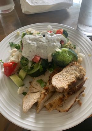 A picture of Greek chicken and couscous.