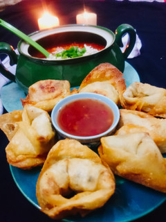A picture of Fried_wontons with hot and sour soup.