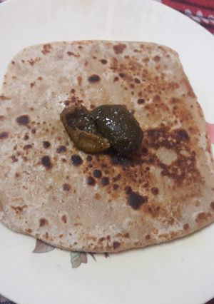 A picture of Namak ajwain ka Parantha with aam ka achar.