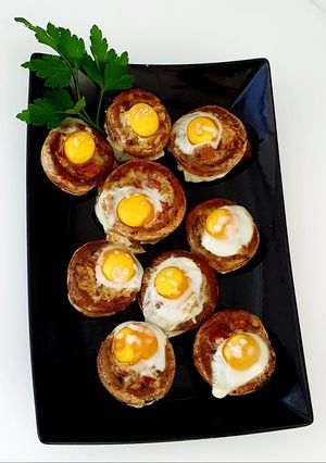 Una foto de Champiñones🍄 rellenos de jamón y huevo de codorniz🍳