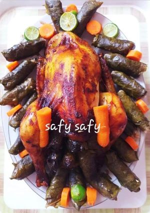 A picture of Roast Chicken Stuffed with Grape Leaves.