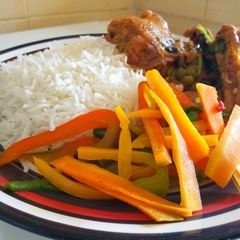 A picture of Coconut Chicken Served With Rice and Stir-Fry Vegetables.