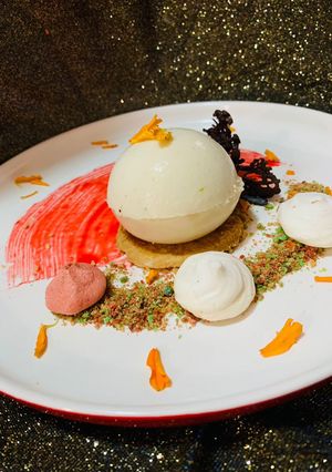 Una foto de Panna Cotta con coulis de maracuyá