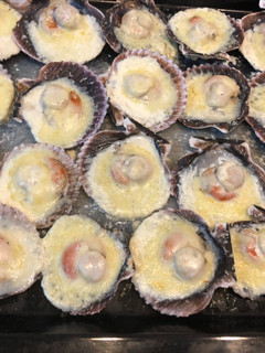 Una foto de Ostiones 🦪 a la parmesana