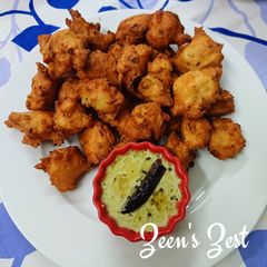 A picture of Mysore Bajji with Spring Onion Greens.