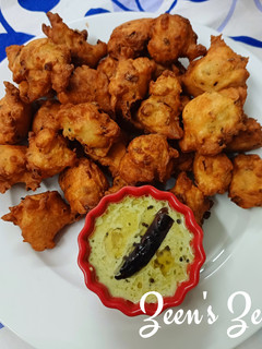 A picture of Mysore Bajji with Spring Onion Greens.
