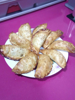 Una foto de Empanadillas rápidas de morcilla y cebolla confitada