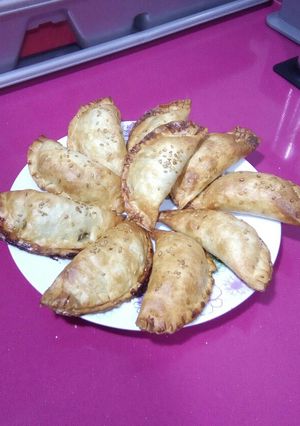 Una foto de Empanadillas rápidas de morcilla y cebolla confitada