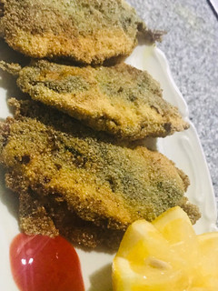 Una foto de Sardinas rellenas con una salsa especial 🐟(manera marroquí)