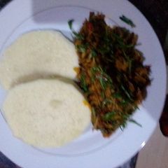 A picture of Yam and ugba sauce(oil beans).
