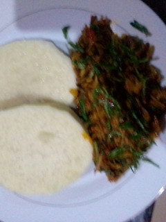 A picture of Yam and ugba sauce(oil beans).