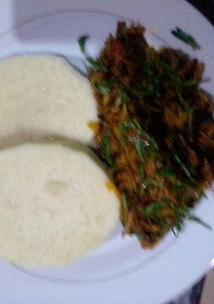 A picture of Yam and ugba sauce(oil beans).