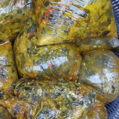 A picture of Yellow maize moi moi.