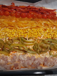 Una foto de Pizza arco-iris