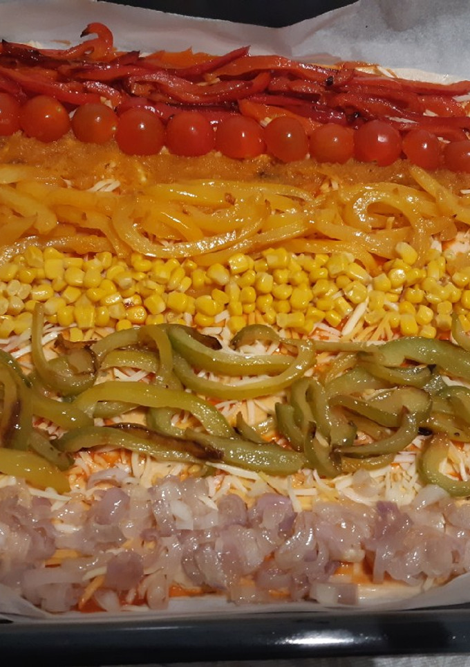 Una foto de Pizza arco-iris