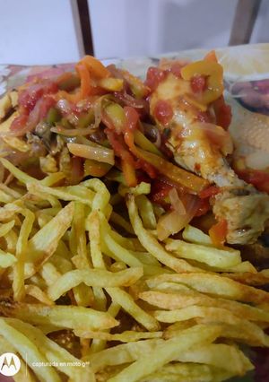 Una foto de Pollo a la portuguesa 🍗🍲