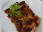 Una foto de lasagna de plátano y queso