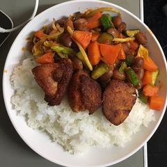 A picture of White rice and mix vegetables with Adsuki beans.