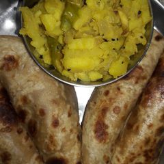 A picture of Paratha and Potatoes fry.
