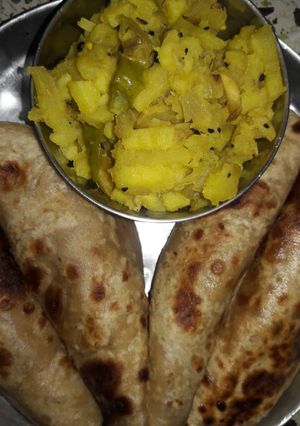 A picture of Paratha and Potatoes fry.