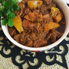 A picture of সাতকরা দিয়ে গরুর মাংসের তরকারী। Beef curry with Shatkora.