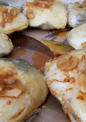 A picture of Hake with Fried Garlic.