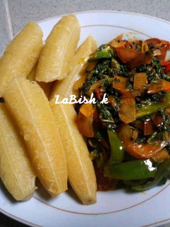 A picture of Ripe Plantain and stir fried veggies.