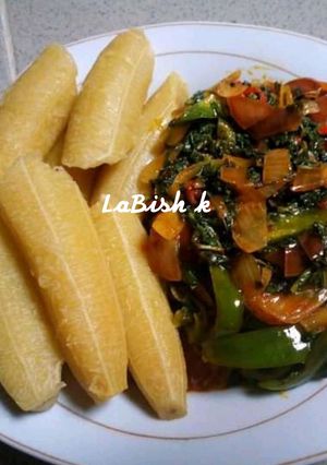 A picture of Ripe Plantain and stir fried veggies.