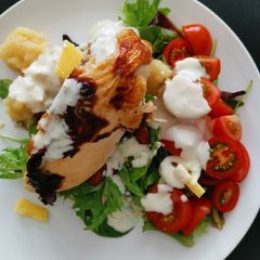 A picture of Butter milk roast chicken w/field greens.
