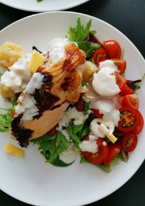 A picture of Butter milk roast chicken w/field greens.