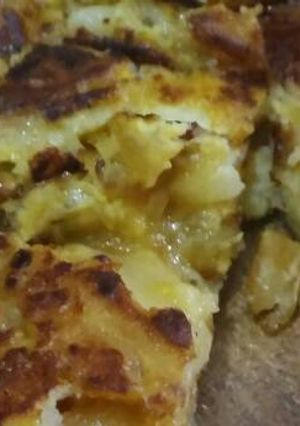 Una foto de Tortilla de papa y cebolla