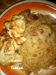 A picture of Spaghetti and fry egg.
