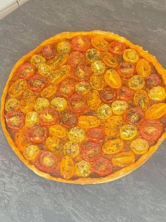 Une photo de Tarte aux tomates cerises et pesto