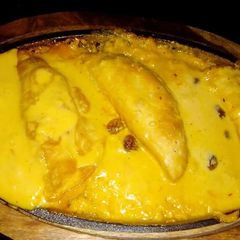 A picture of Mava gunjiya in kesariya rabdi.