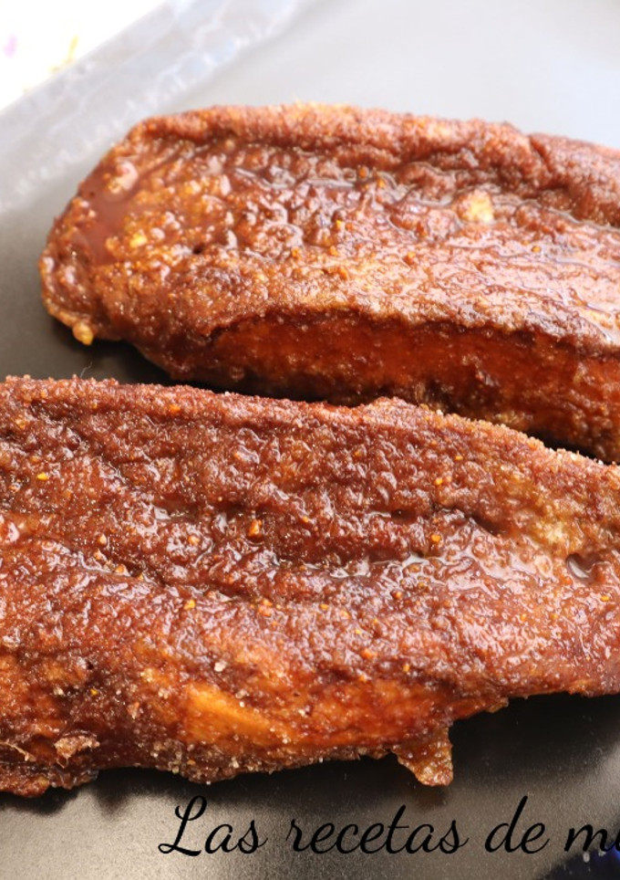 Una foto de Torrijas de chocolate y polvo de naranja