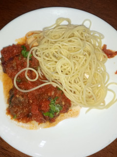 A picture of Meatballs in sauce.
