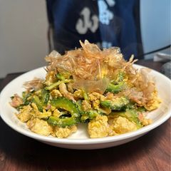 A picture of Stir fried bitter melon with bacon and egg in Okinawa style （ゴーヤチャン プルー）.