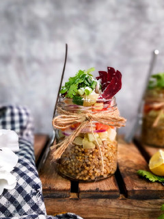 A picture of Pearl Millet salad, Indian salsa and Curry leaves scented oil.