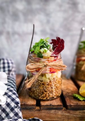 A picture of Pearl Millet salad, Indian salsa and Curry leaves scented oil.