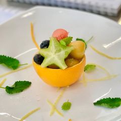 A picture of Fresh Fruits Salad with honey citrus dressing.