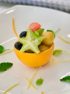 A picture of Fresh Fruits Salad with honey citrus dressing.