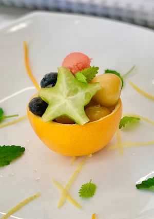 A picture of Fresh Fruits Salad with honey citrus dressing.