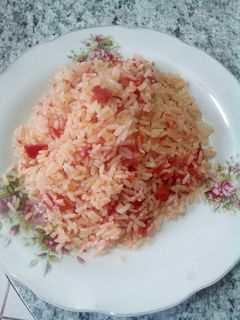 Una foto de Arroz entomatado