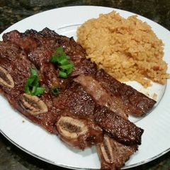 A picture of Brad's teriyaki grilled short ribs with coconut curry rice.
