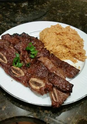 A picture of Brad's teriyaki grilled short ribs with coconut curry rice.